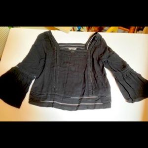 ITEM NO. 7: Forever 21 black shirt.